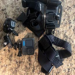 Action cam with chest + head mounts.