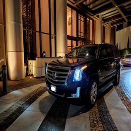 Cadillac Escalade with a driver