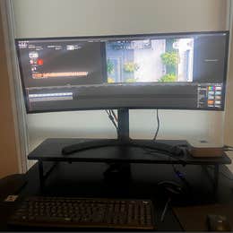 Ingest + rough-cut on a Mac Mini with dual monitors.