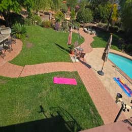 Pool side and grass area