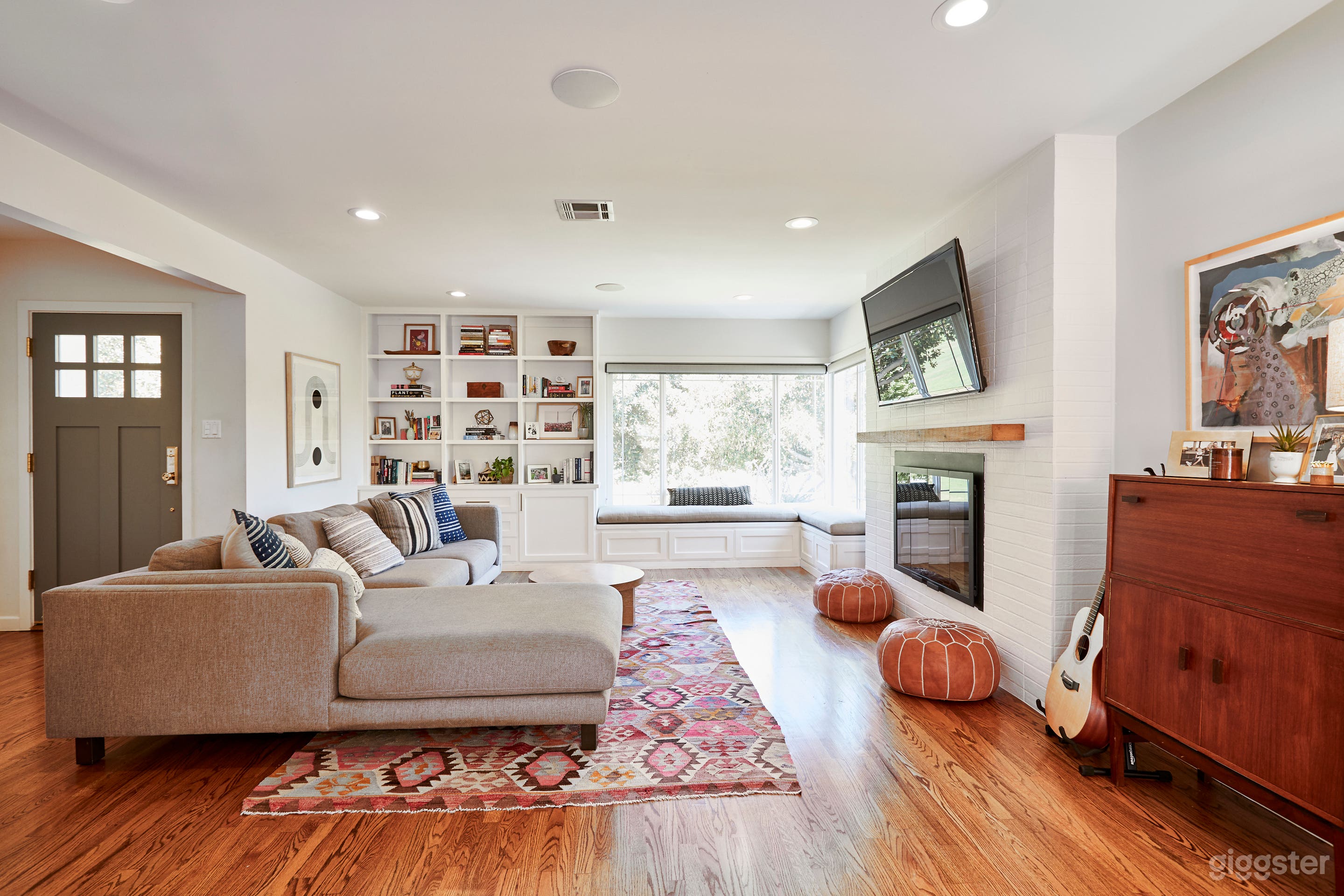 Living Room with wrap-around window, overlooking the park.