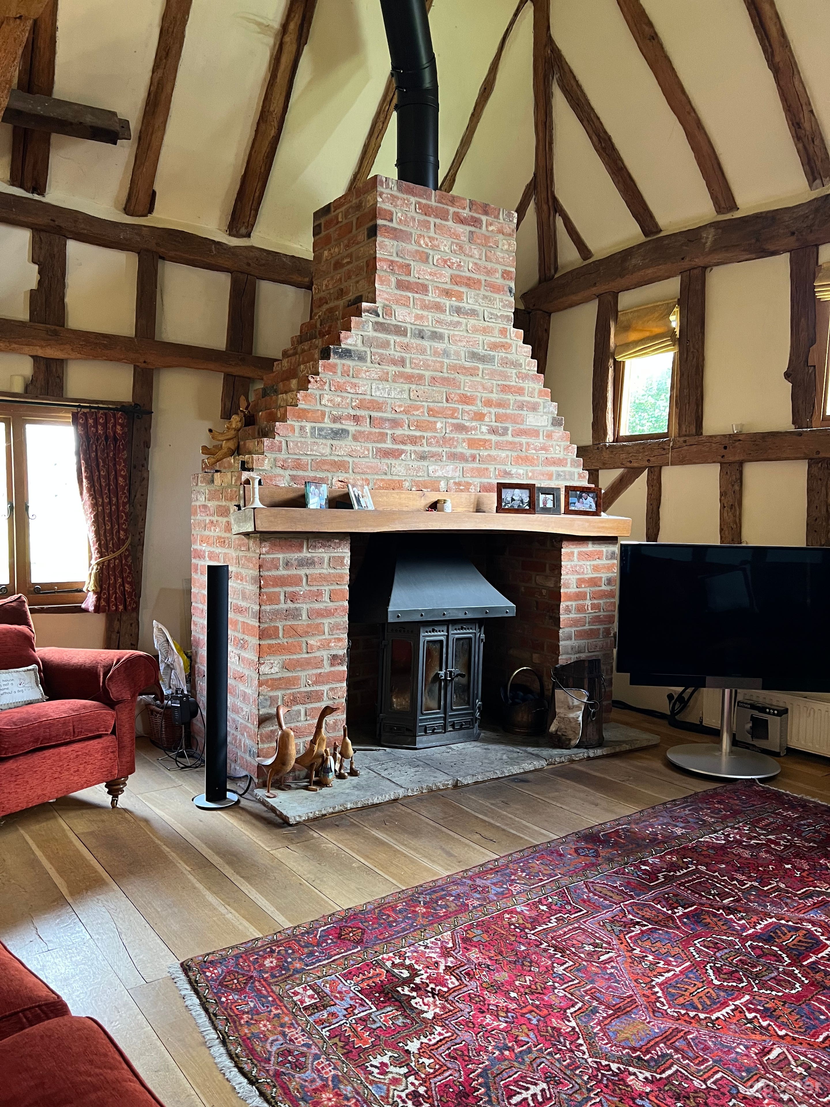 Brick fireplace inside barn