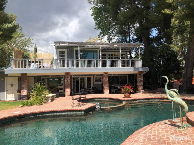   Golf course view, dark pool , mid century/retro 