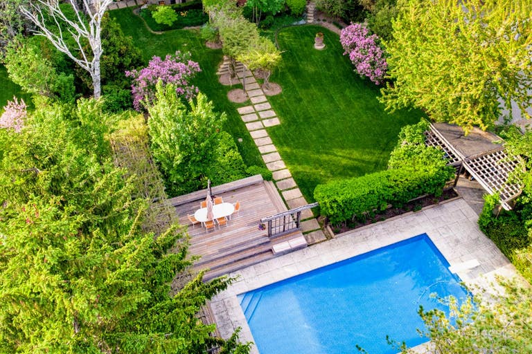  Purple lilacs and wisteria greet us in May. Beautiful landscaping throughout. 