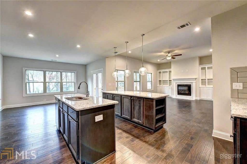 Double Island Kitchen into Family Room from Butler's Pantry Area