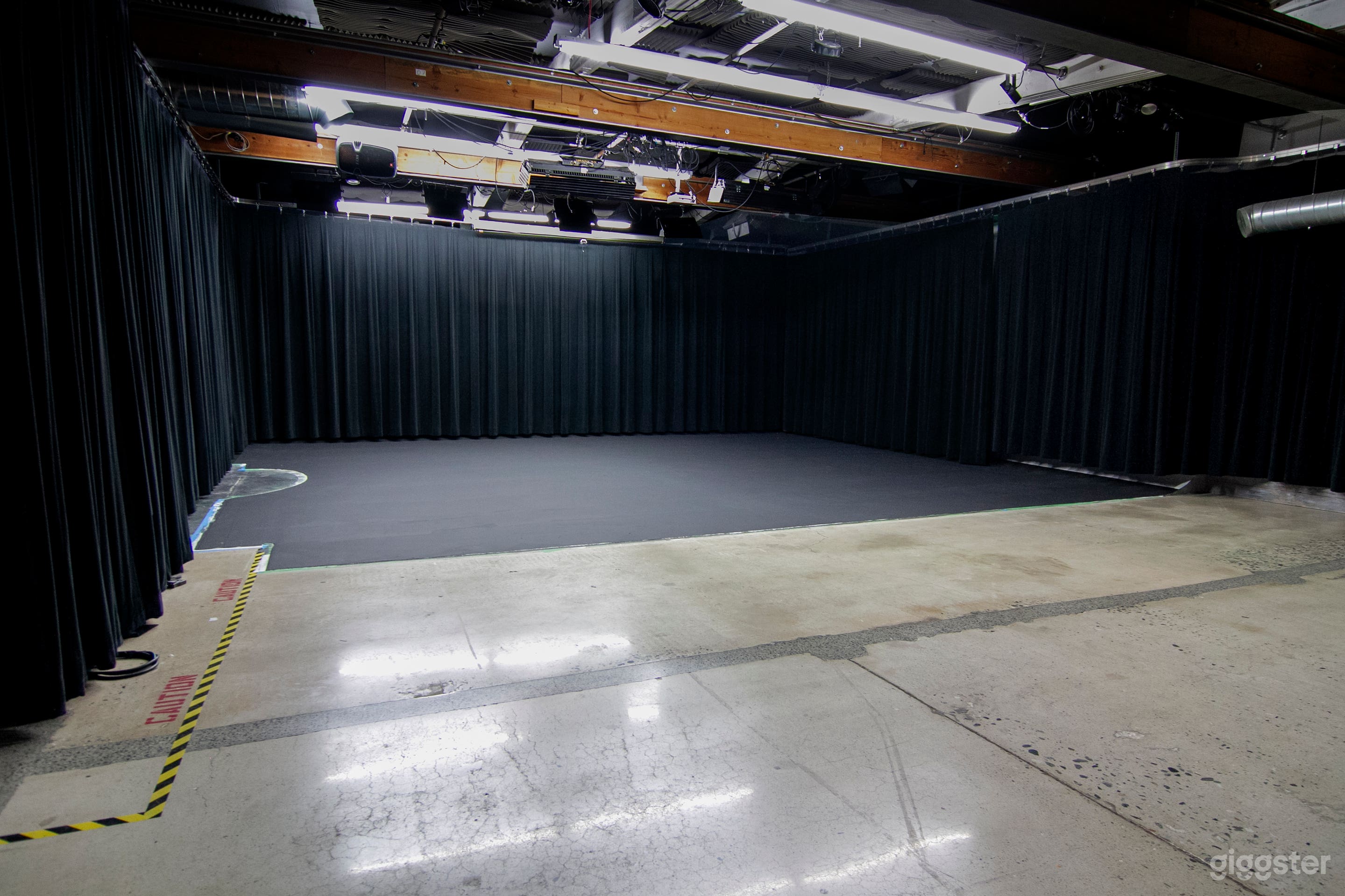 Black Void (Additional One-Time Fee of $350 if using black curtains which cover the entire cyc)