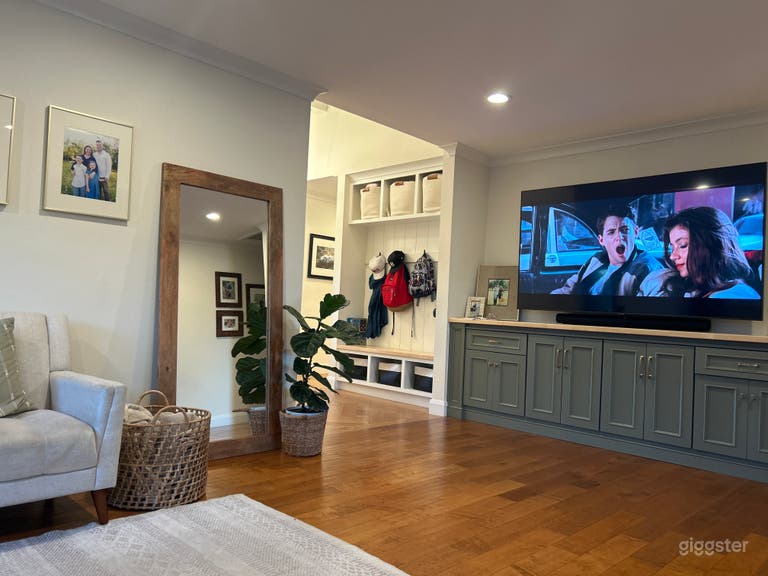  Living room aka viewing room. Full sectional and great natural fill lighting. 