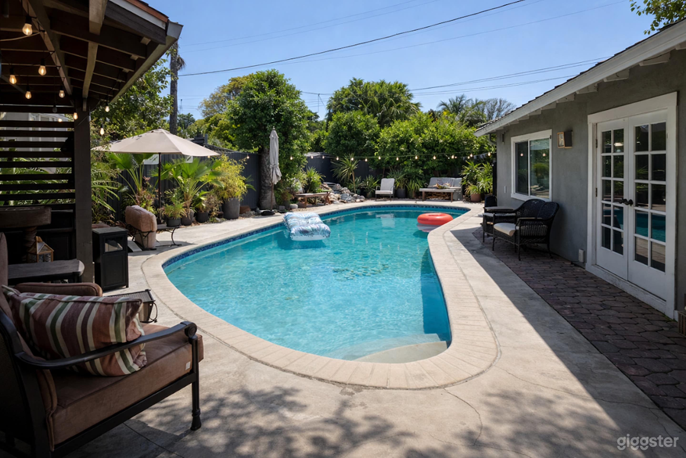Tropical Private Pool with Waterfall & Lush Greenery Photo 2