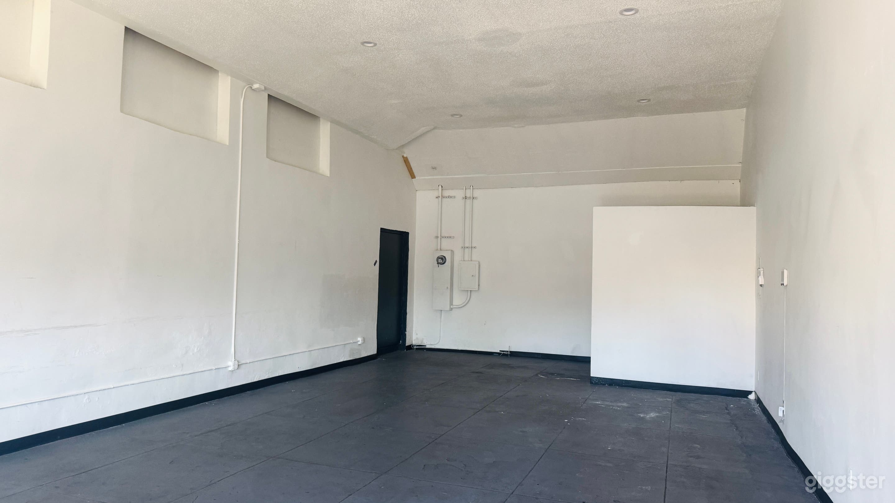 Empty Store Warehouse with Booths, Chairs Photo 4