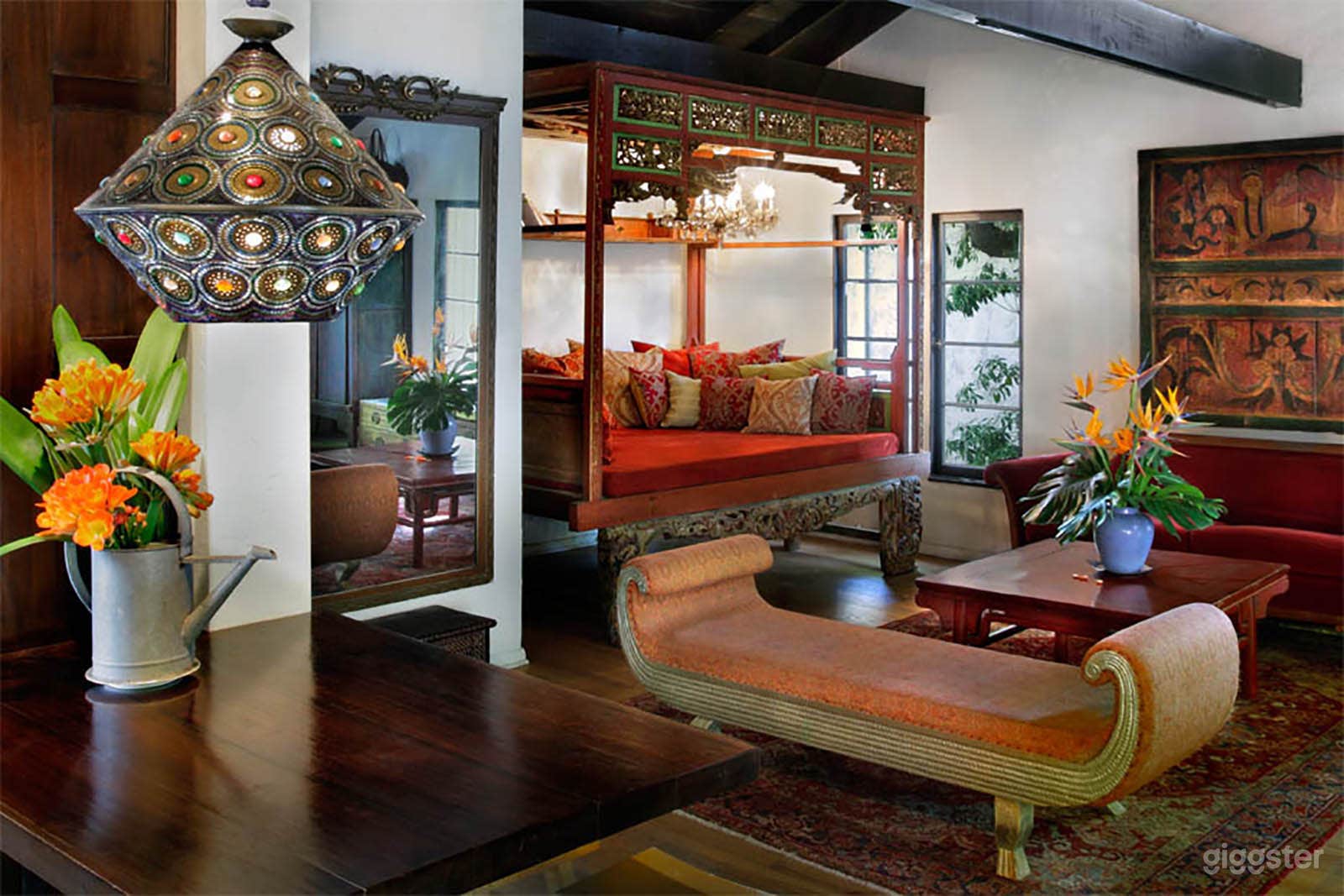 Living room has high ceilings. Could hang lighting off of beams.