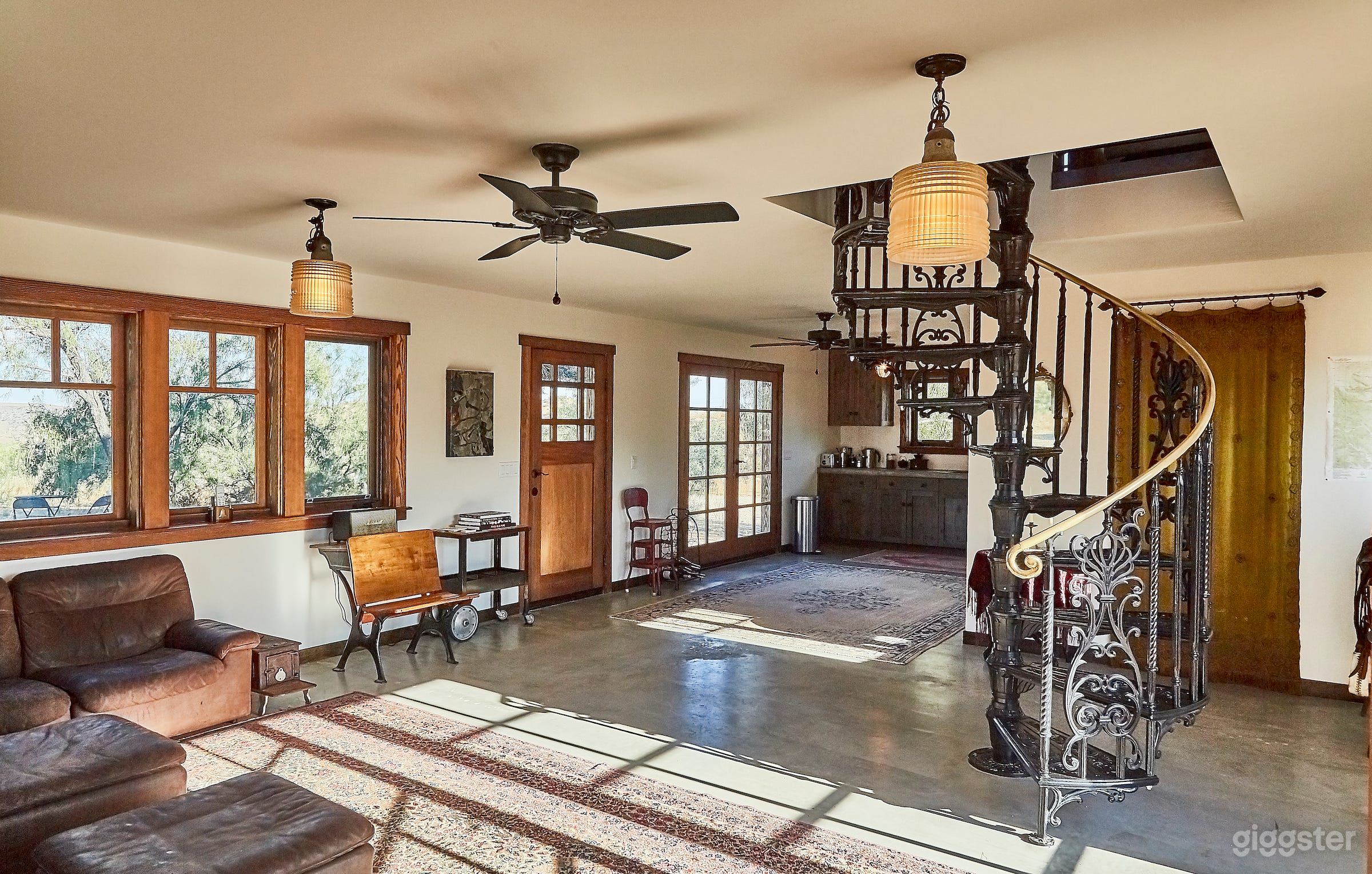 Open plan Kitchen Living Room with plenty of light and vintage industrial light fixtures from the Soviet Union