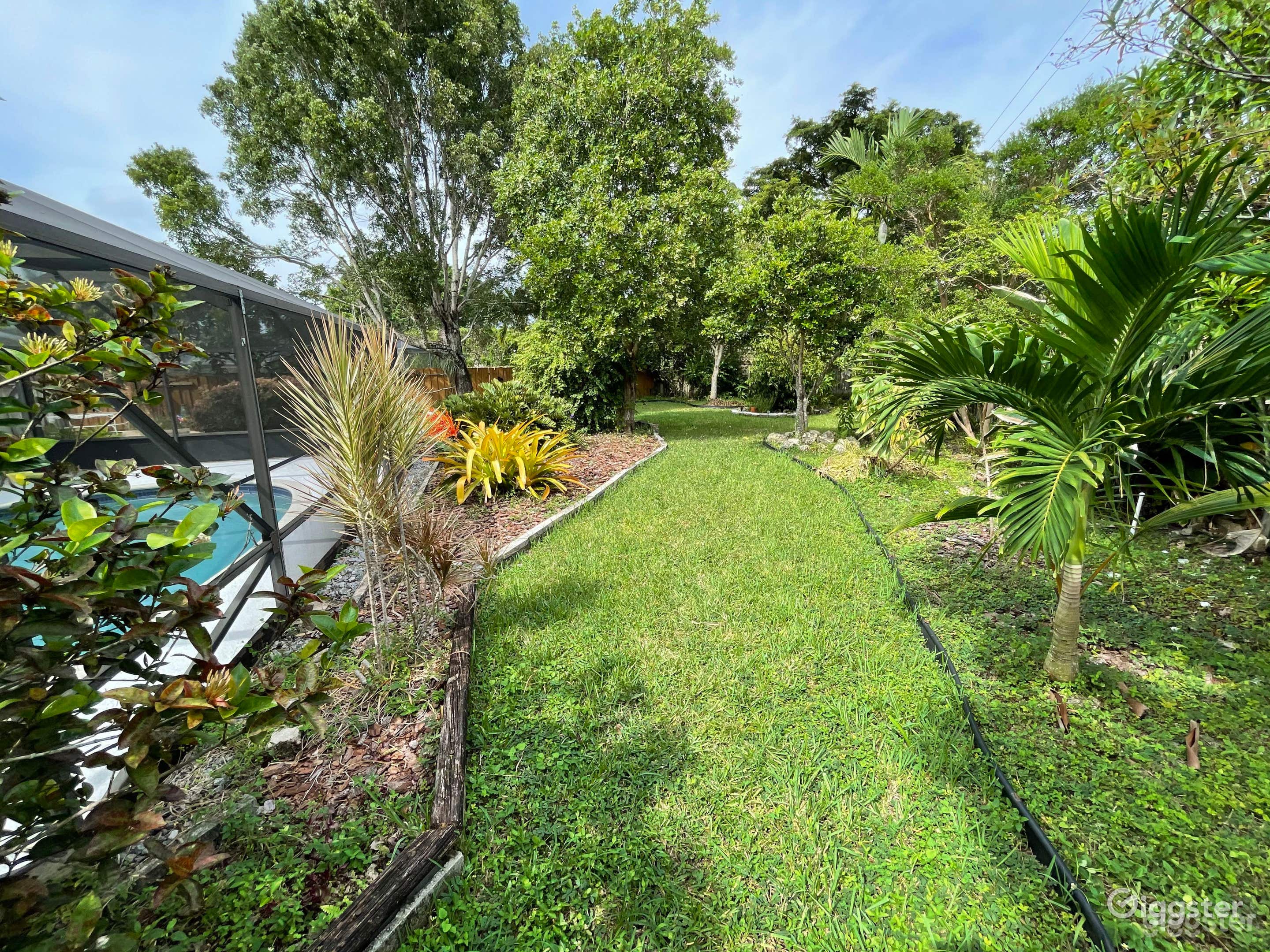 Amazing Outdoor Pool with Oasis Garden View Photo 4
