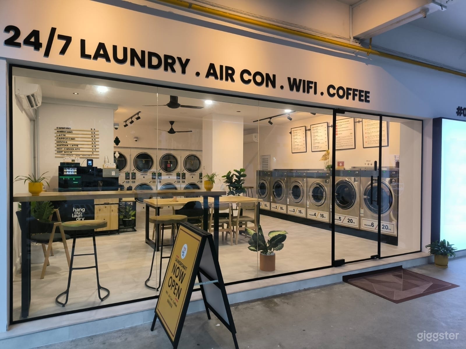 Modern Laundromat with Air Con & Coffee Photo 3