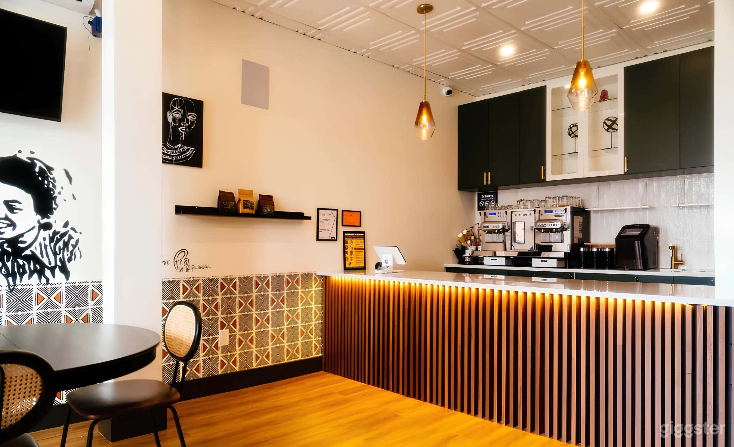 Every inch of our space tells a story—from the hand-painted murals by local artists that stretch across our walls, to original framed works.