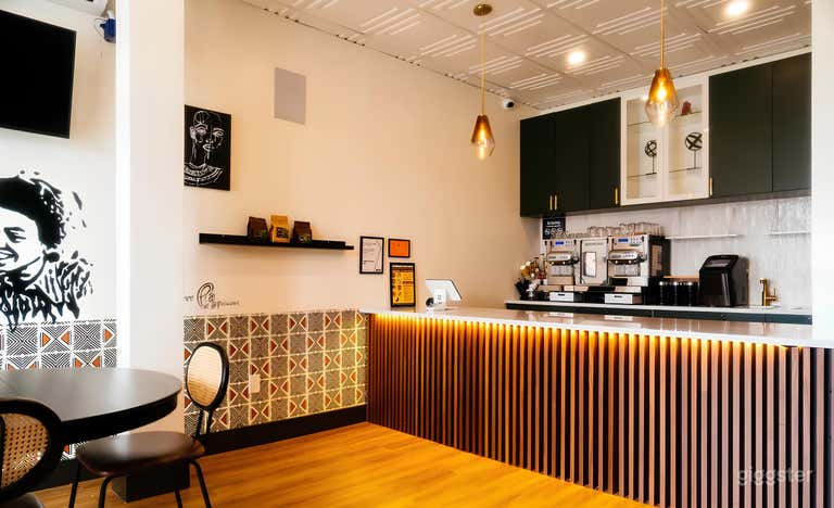  Every inch of our space tells a story—from the hand-painted murals by local artists that stretch across our walls, to original framed works. 