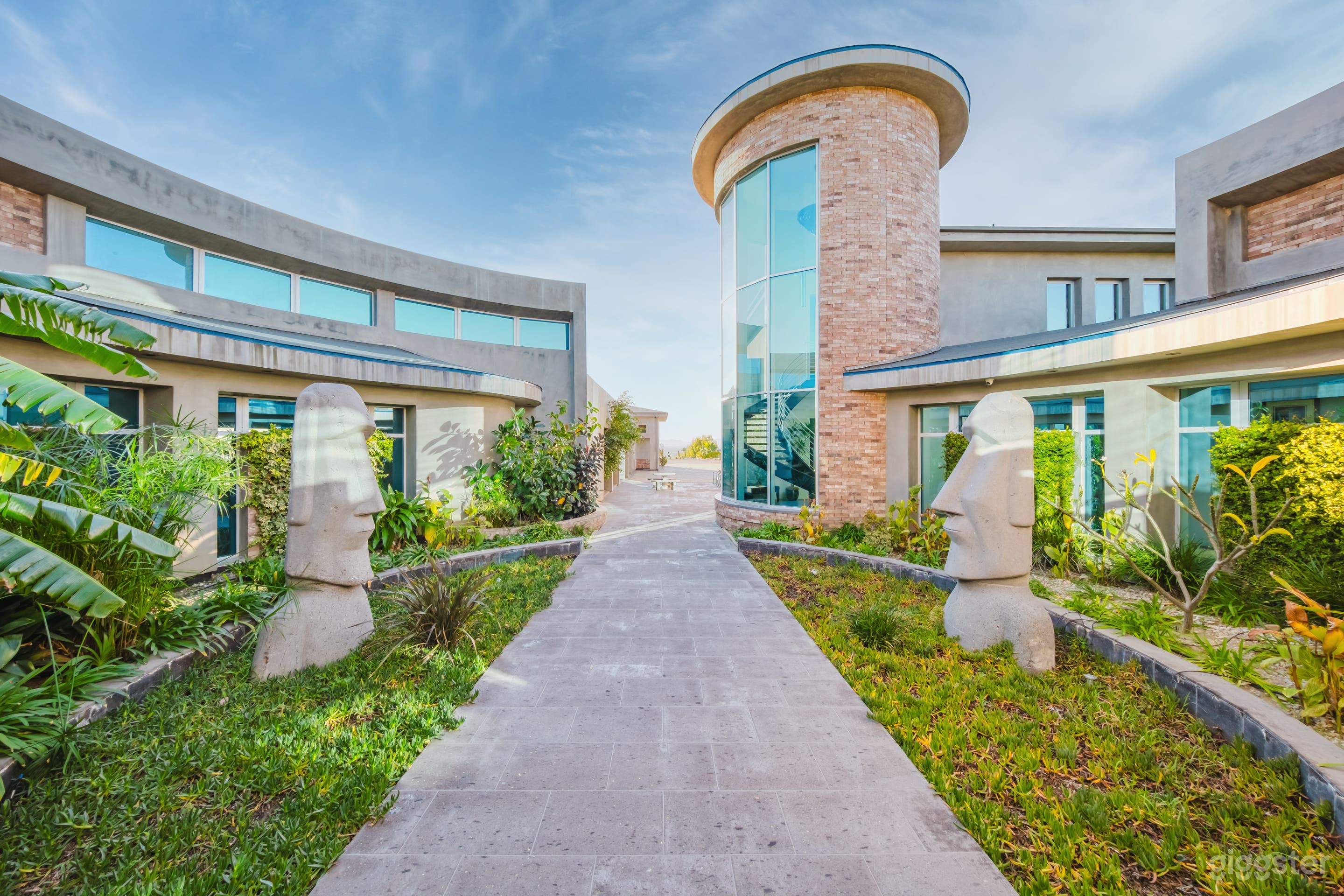 Circular Glass Estate With Sculpture Court Photo 3
