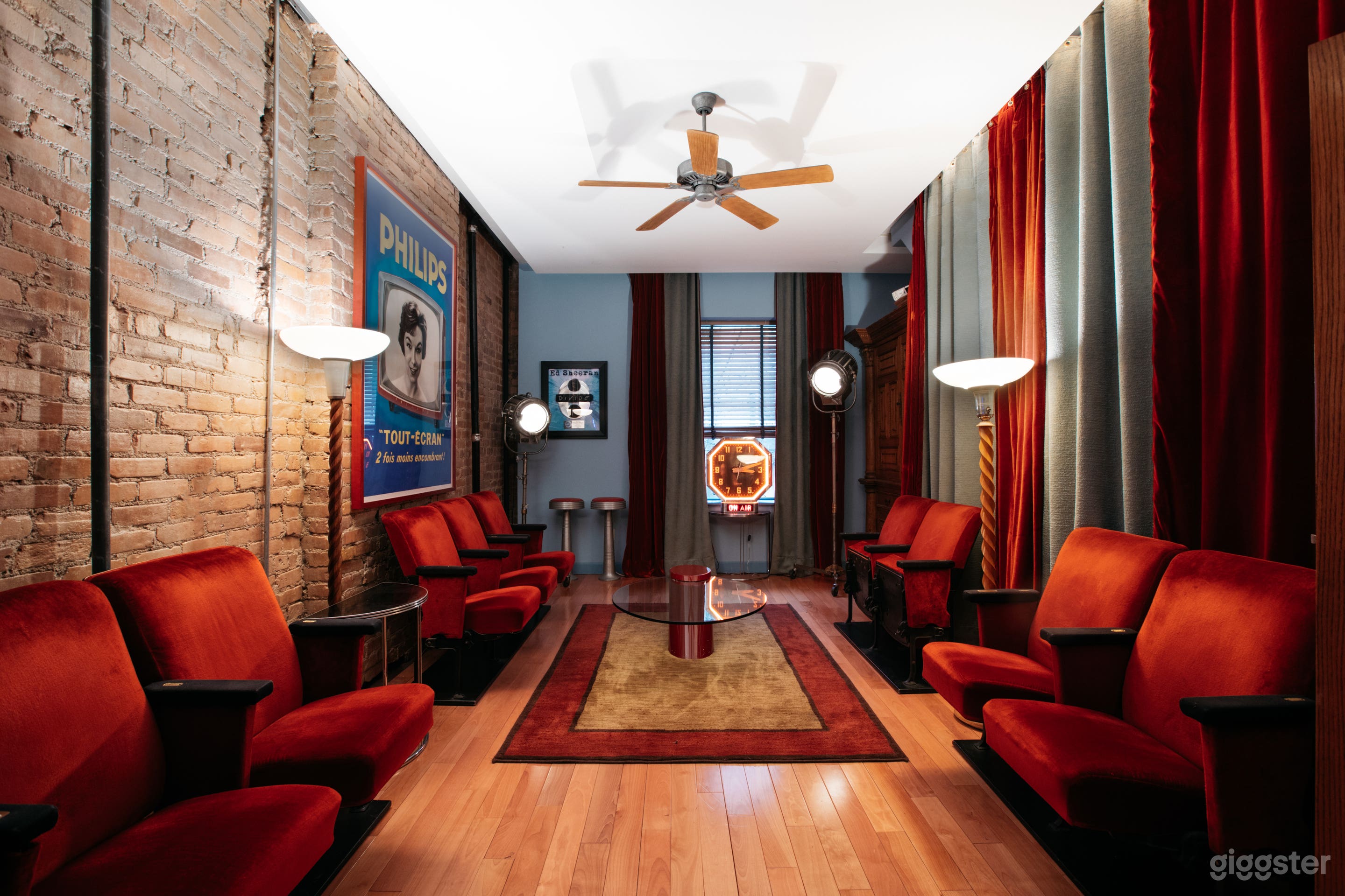 Screening Room: Original Radio City Music Hall seats, 1940s Mole Richardson Hollywood lighting, Art Deco torch lamps, original 1950's French television poster art