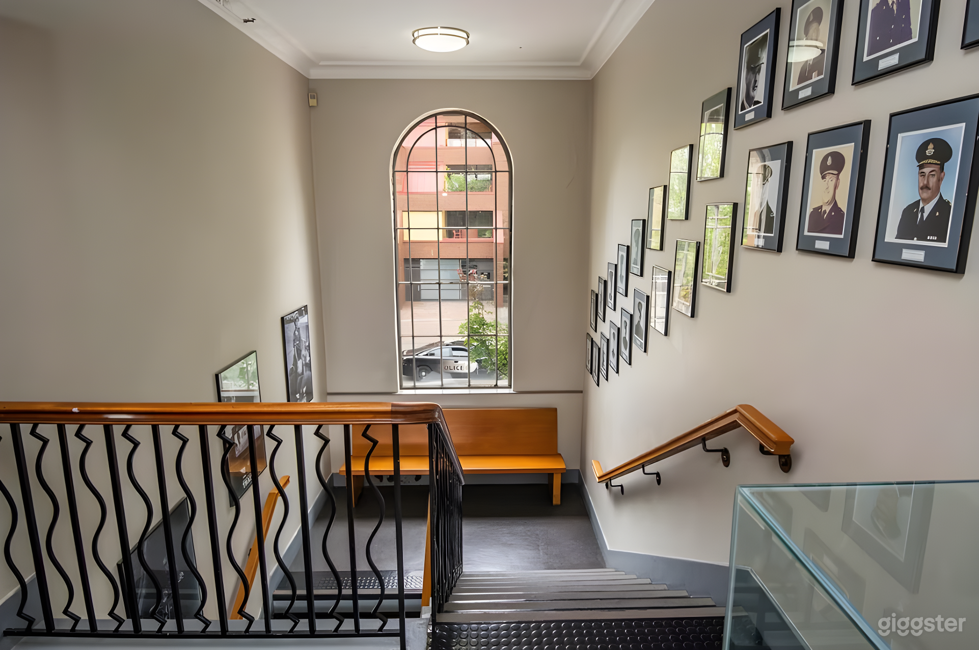 Front Stairwell, 3 flights with beautiful natural light overlooking city street. 1930s build, historic entrance to Court room.
