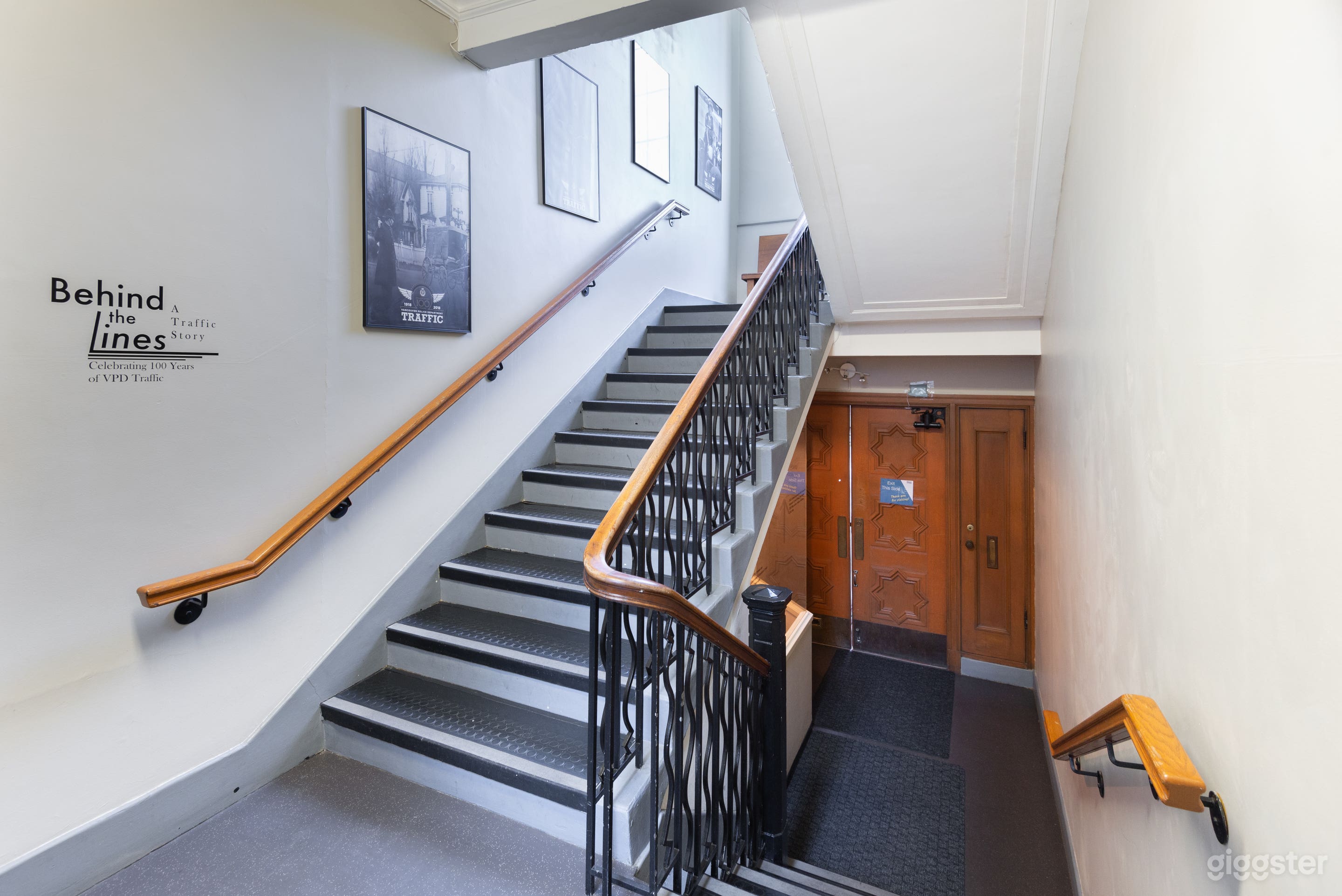 Front Stairwell, looking to ground floor entrance. Historic entry to Court room.