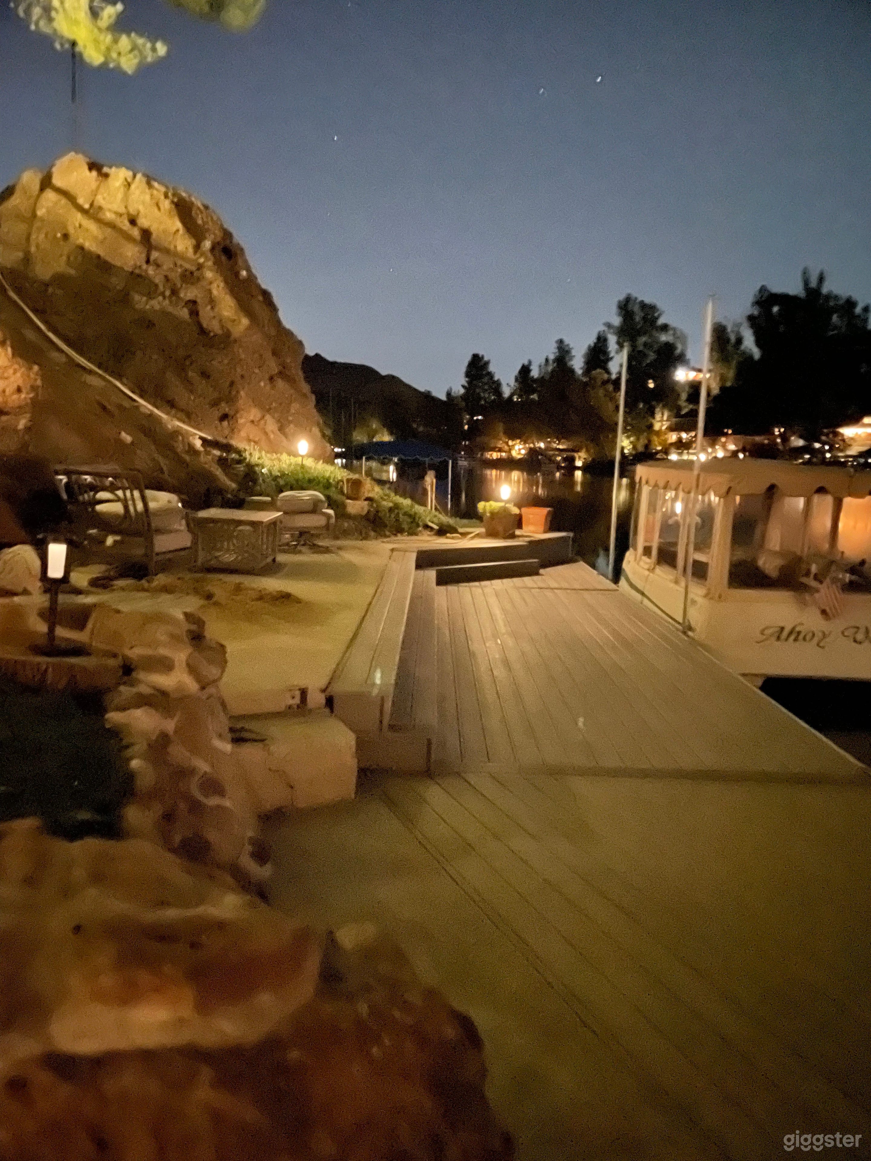 Even better, here’s a shot of our new dock all lit up to show off its charming, warm appeal   Lots of room for the crew to pull back and grab that perfect shot.