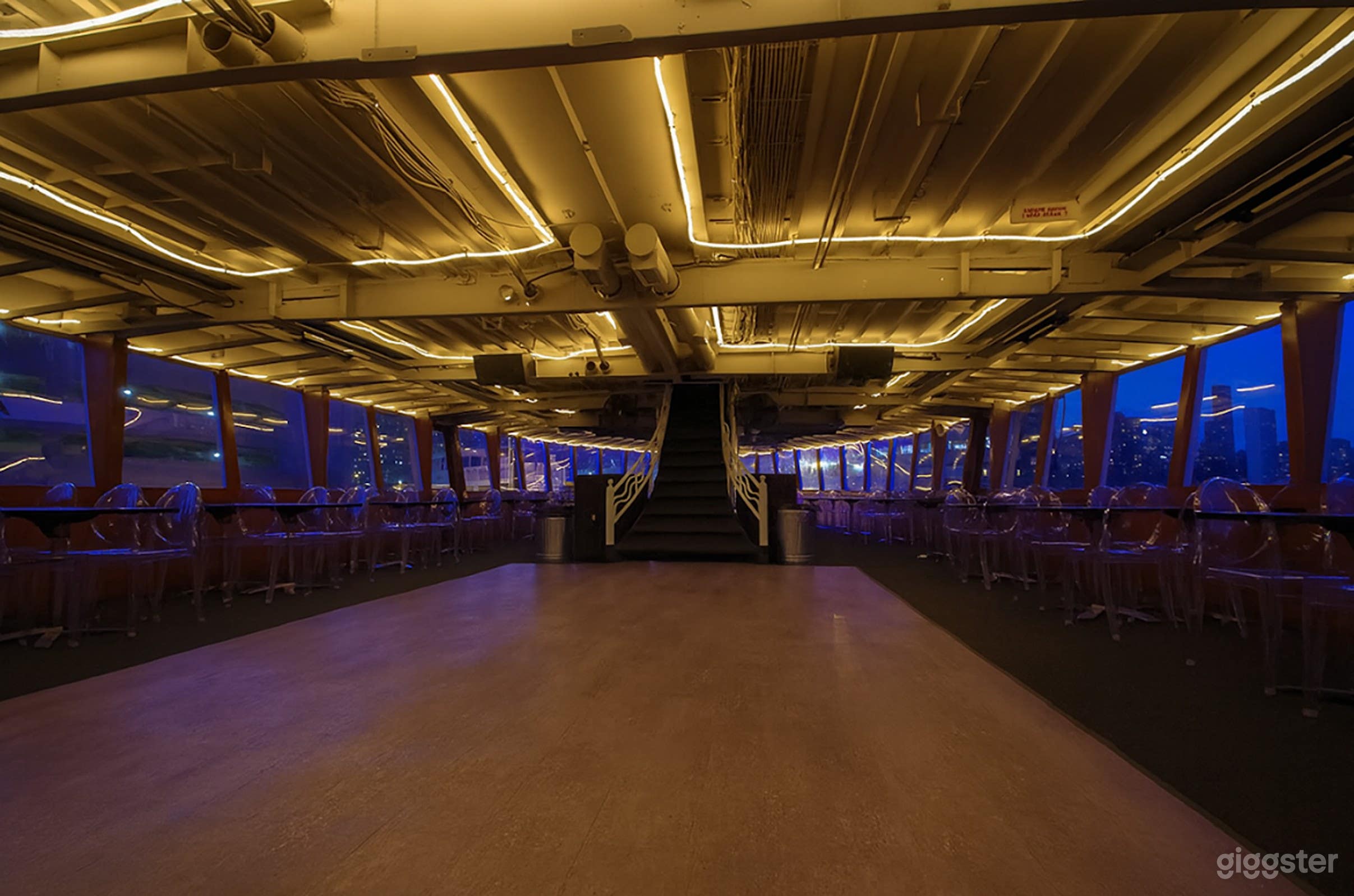 Spacious Main Deck with Dance Floor, Skyline Views &amp; Full AV Photo 1