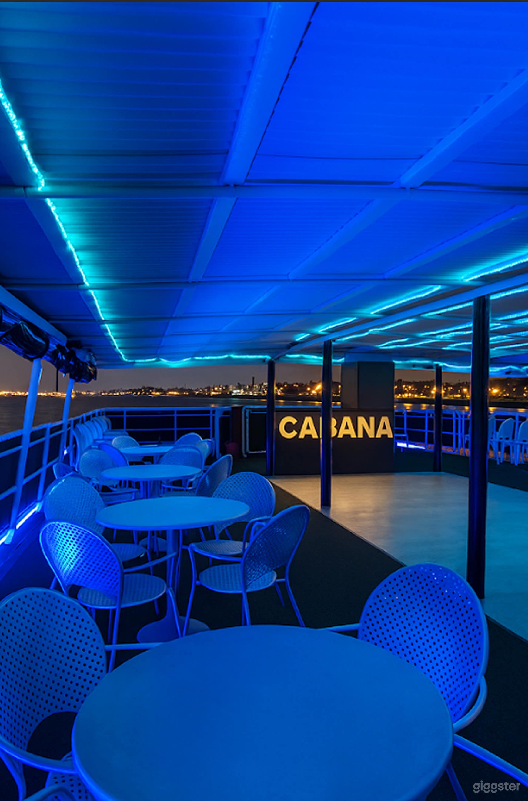 Spacious Main Deck with Dance Floor, Skyline Views &amp; Full AV Photo 3