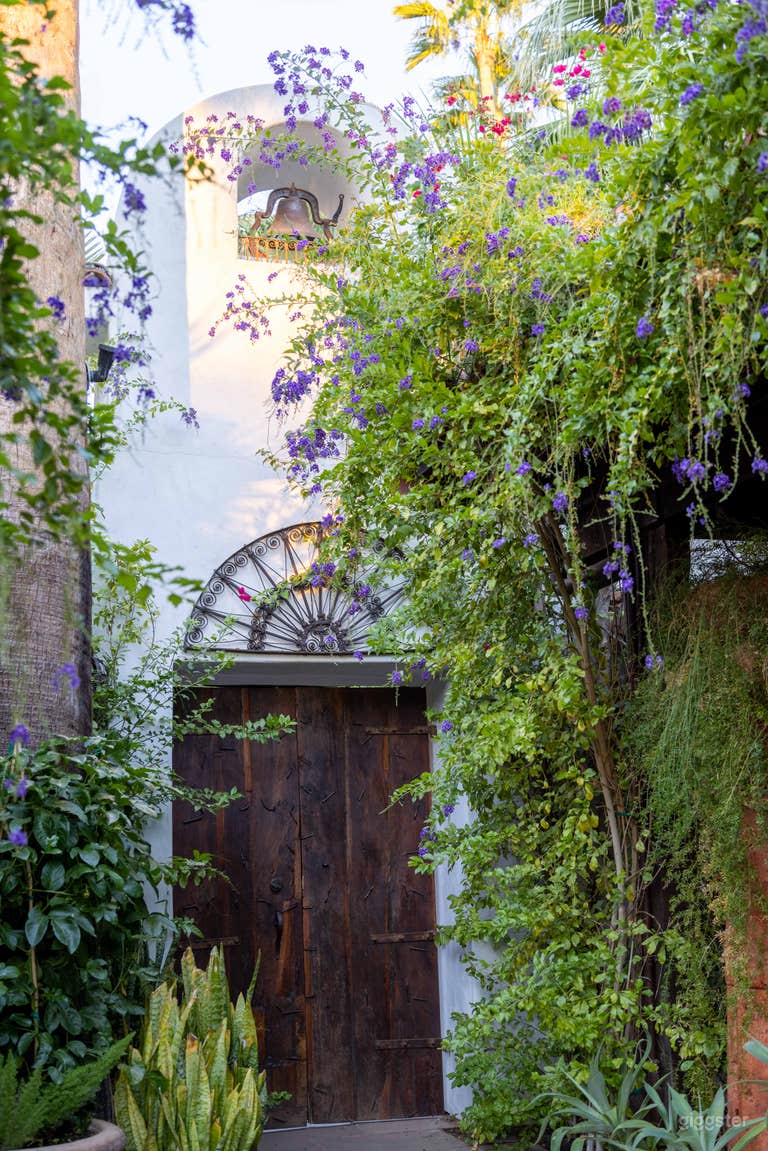  Four renovated Spanish bell towers surrounded by botanical gardens and courtyards.  