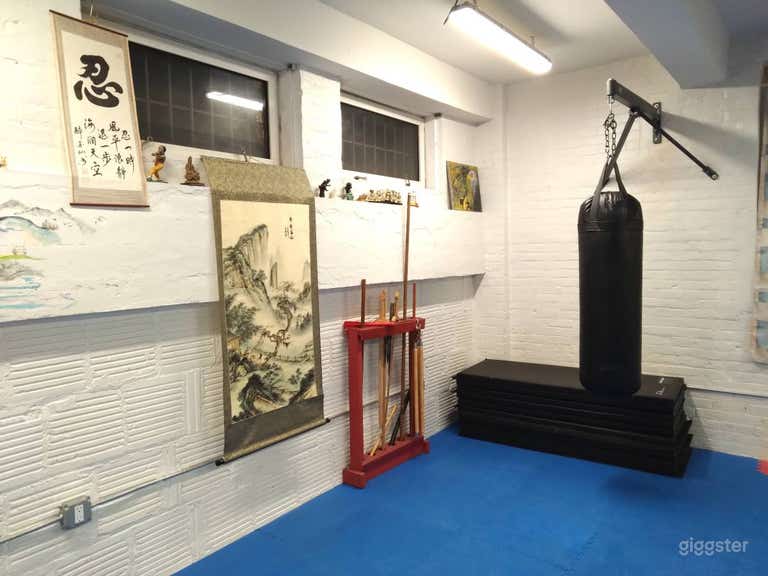  Back room with bag, mats and weapons. 