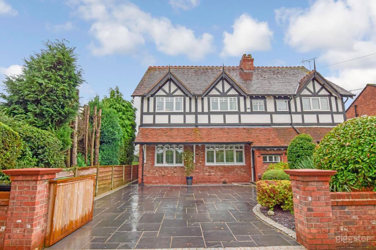 Striking Tudor-Style Facade with Driveway Access
This impressive South Manchester property offers a timeless, Tudor-inspired exterior with red brick detailing, pitched gables, and classic black-and-white timber features. 