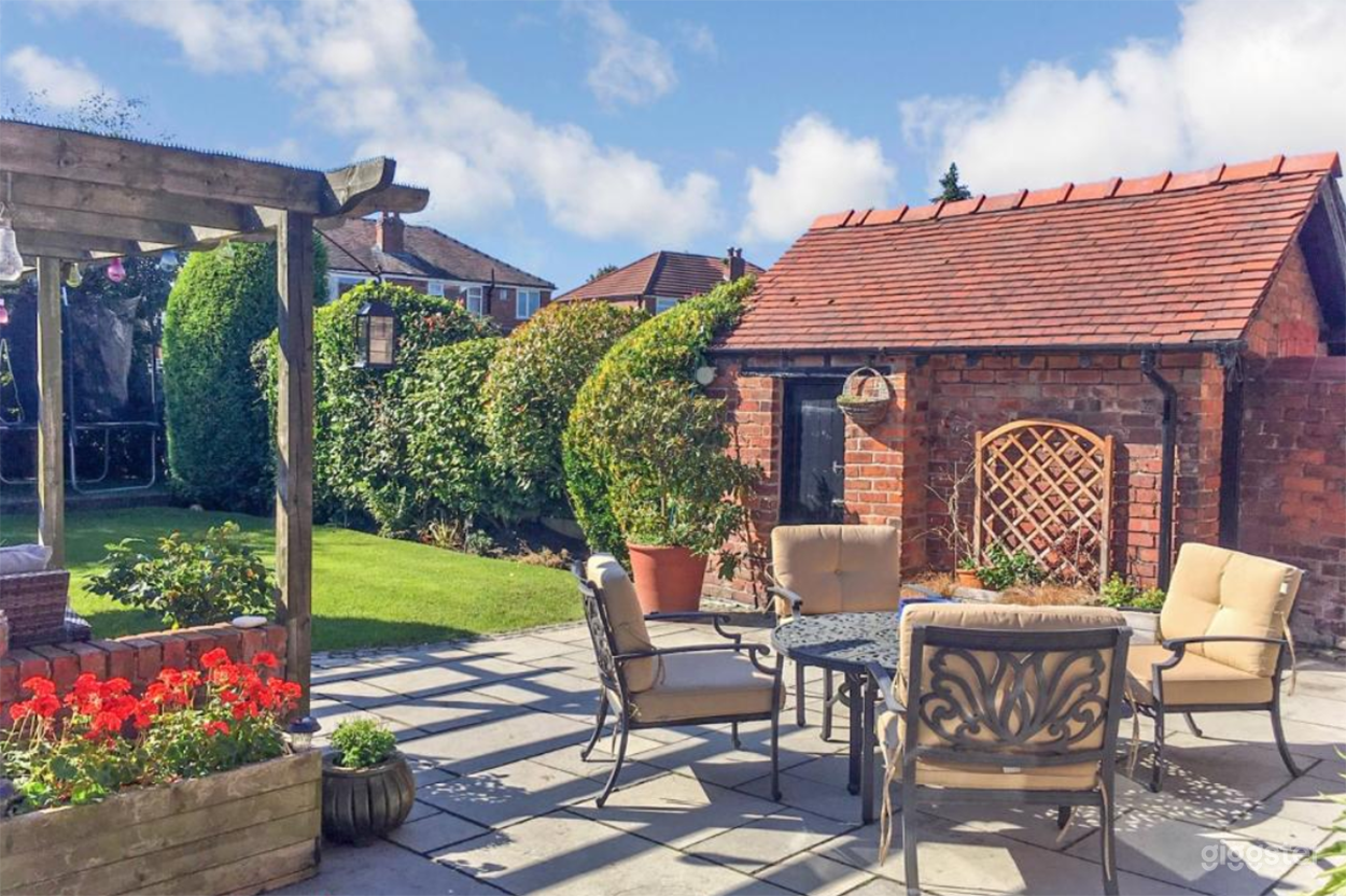 Sun-Soaked Garden with Rustic Patio &amp; Brick Outbuilding
This south-facing garden offers a charming outdoor setting, ideal for lifestyle shoots, alfresco scenes, and relaxed interview setups. 