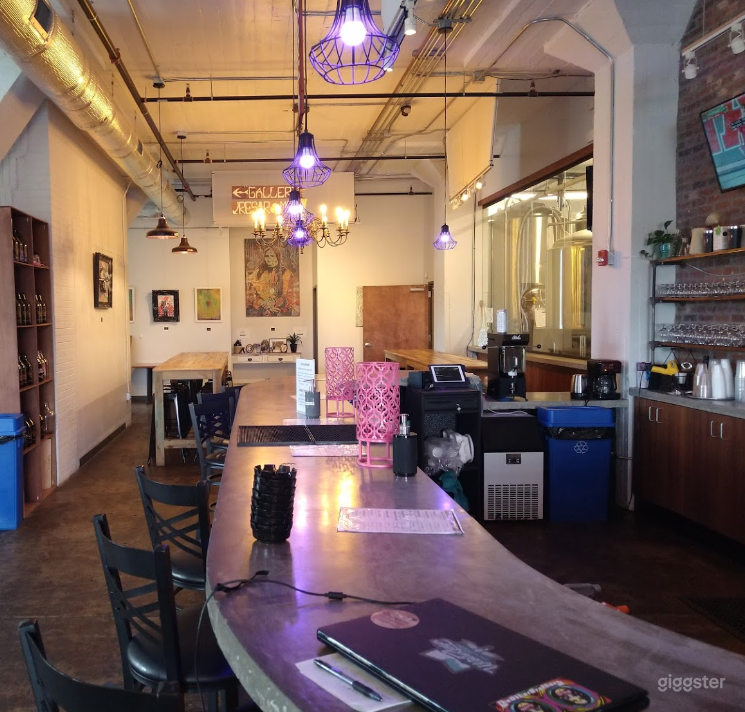  View of bar and community tables to the left of the bar 