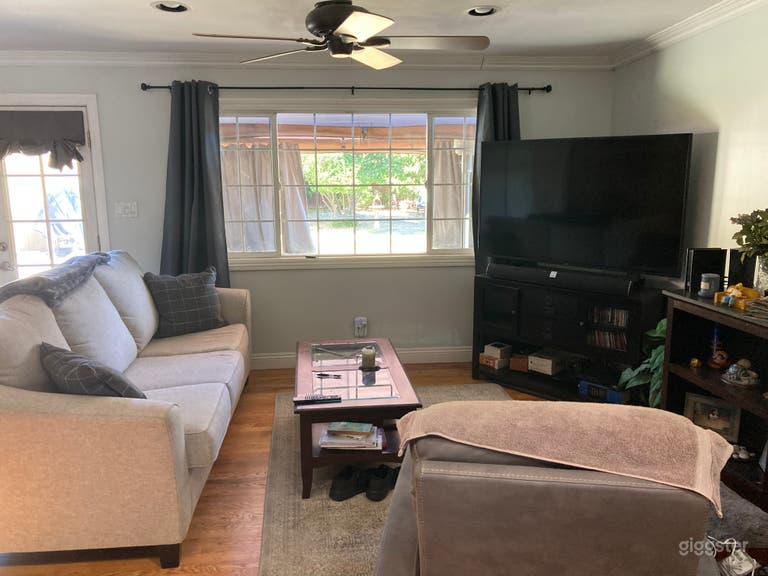  New look to Den/TV Room. Now different colored walls and look then adjoining living room.  