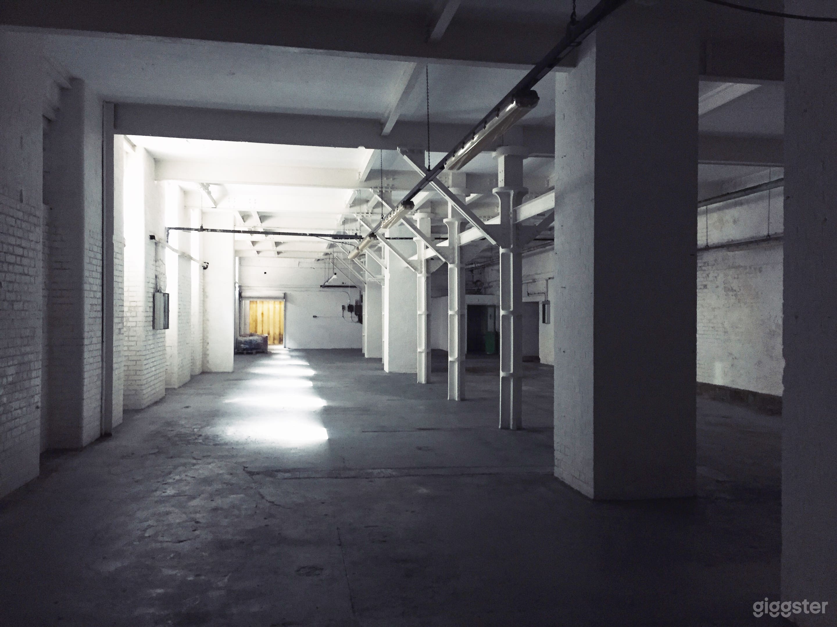 Huge raw and gritty underground factory warehouse  Photo 1