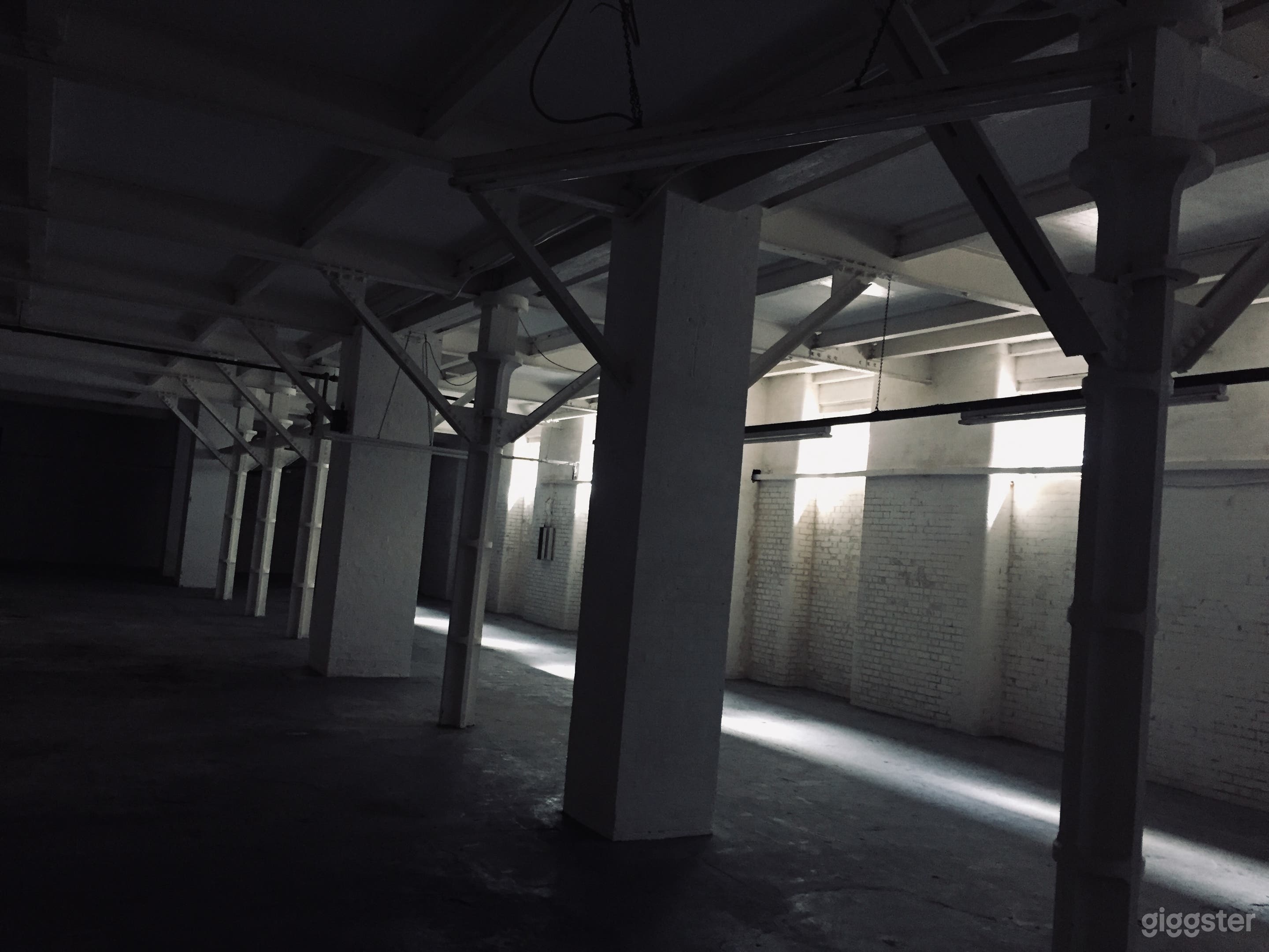 Huge raw and gritty underground factory warehouse  Photo 3