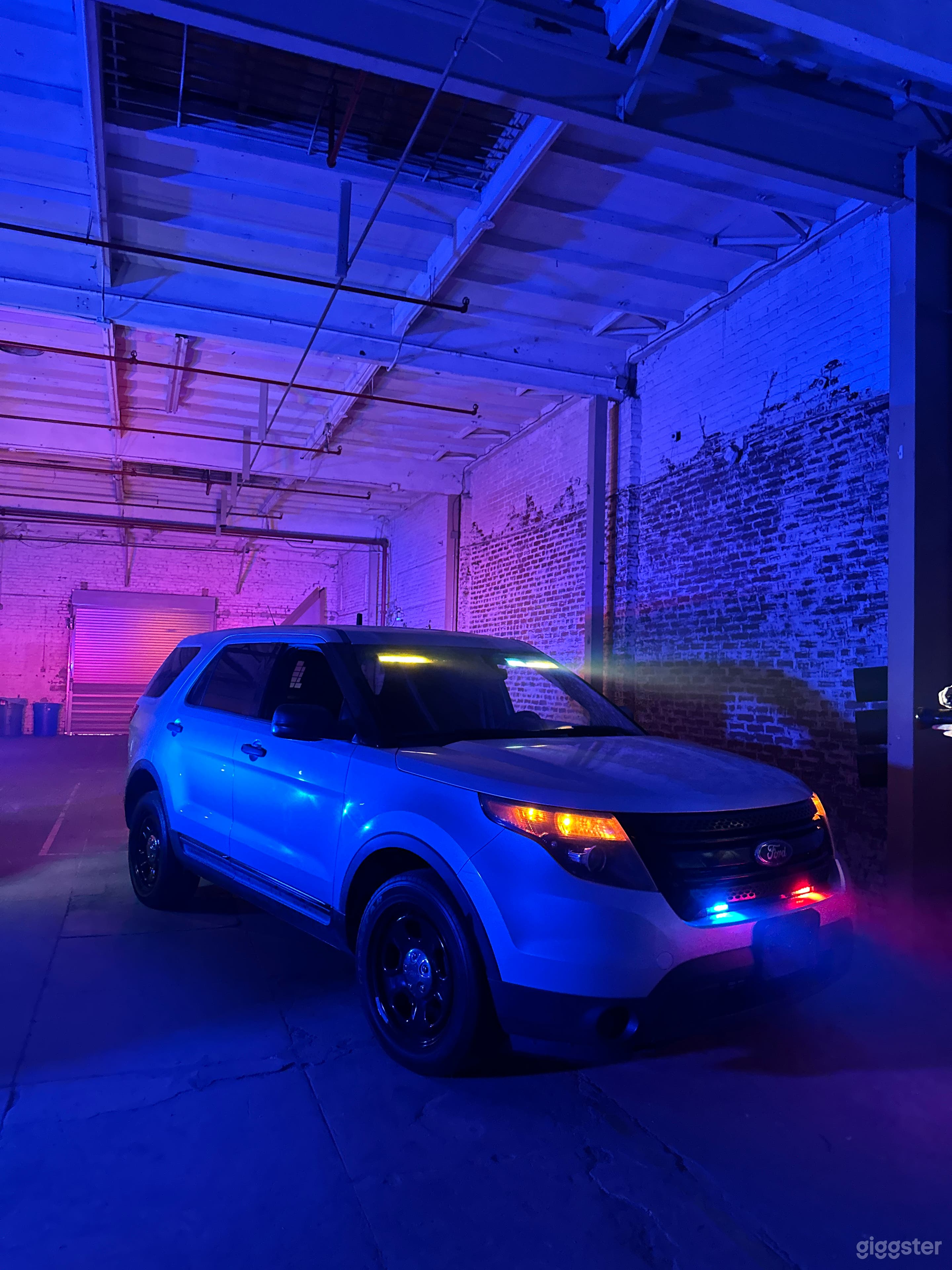 Lighting is undercover. Lighting is in grill red and blue.