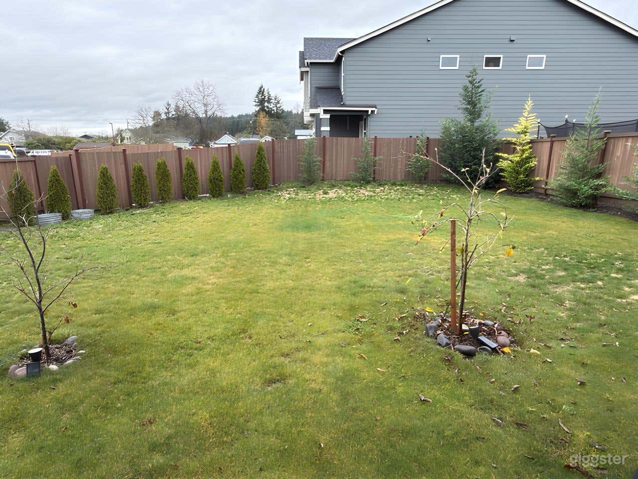 Fully Fenced Backyard Oasis Photo 1