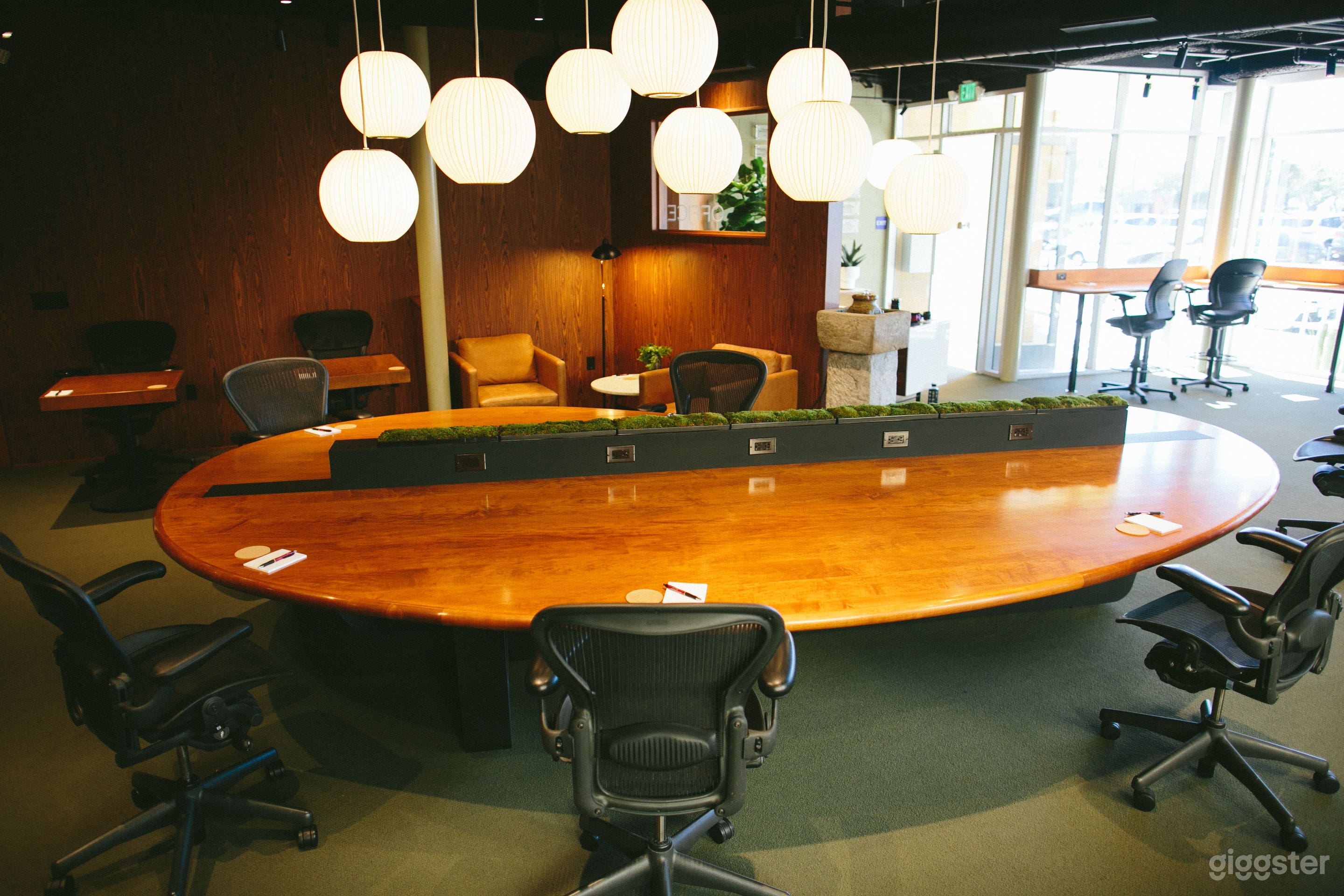 Conference table and paper lantern light fixture