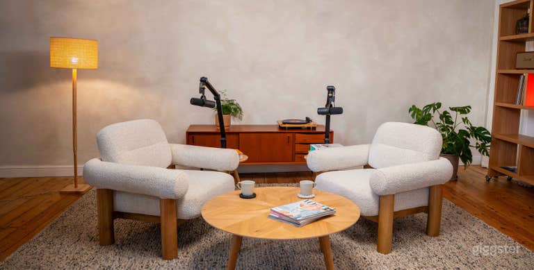  Our signature podcast setup. Stylish, comfortable, and designed to put guests at ease. 