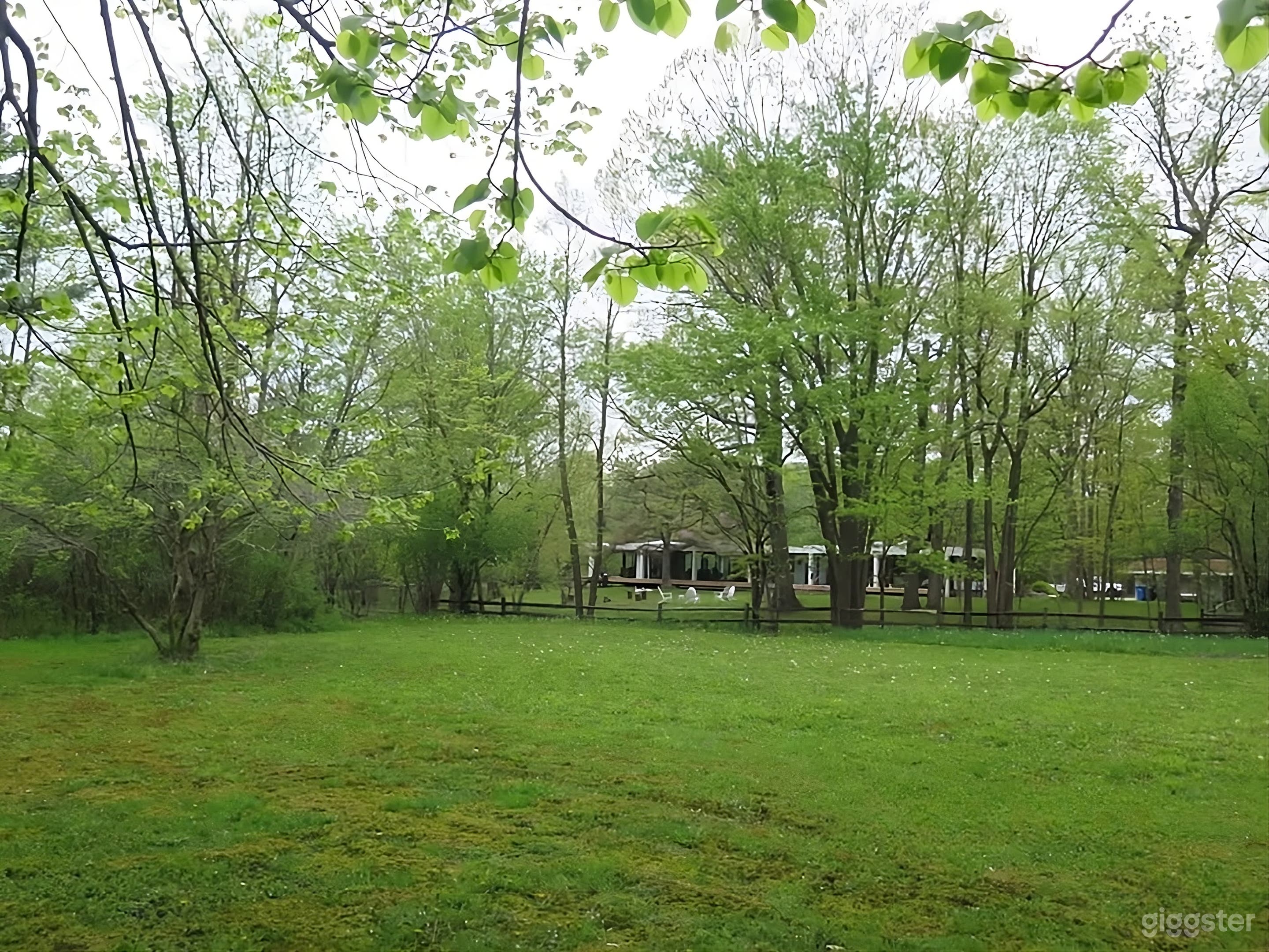 Expansive Riverside Woodland Backyard Photo 3