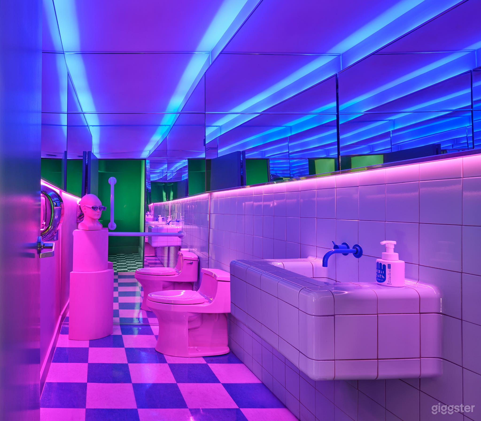 Surreal Pink Lounge with Mirrored Bathroom Photo 2