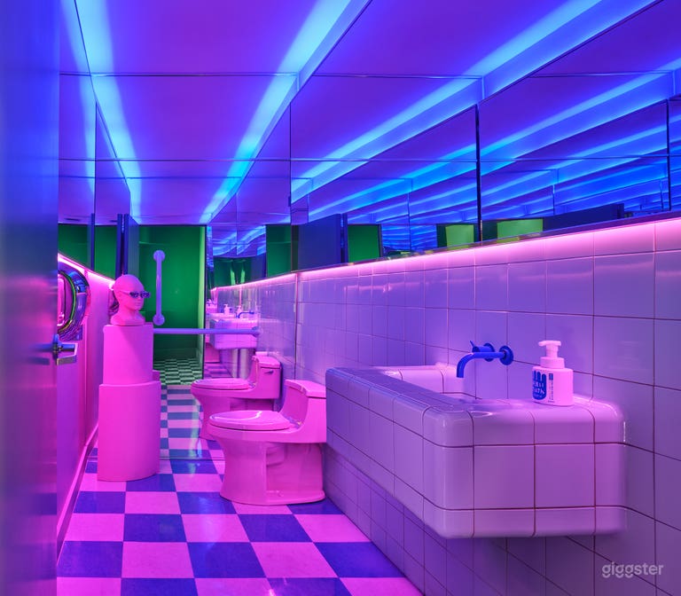  Surreal Pink Lounge with Mirrored Bathroom 