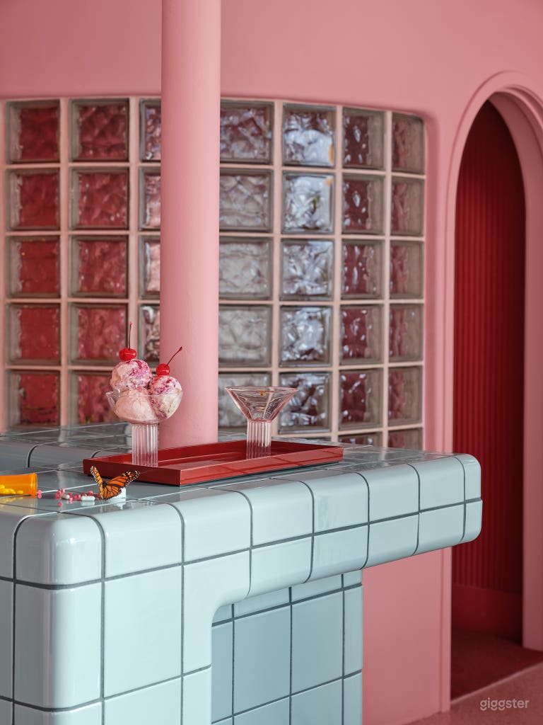  Surreal Pink Lounge with Mirrored Bathroom 