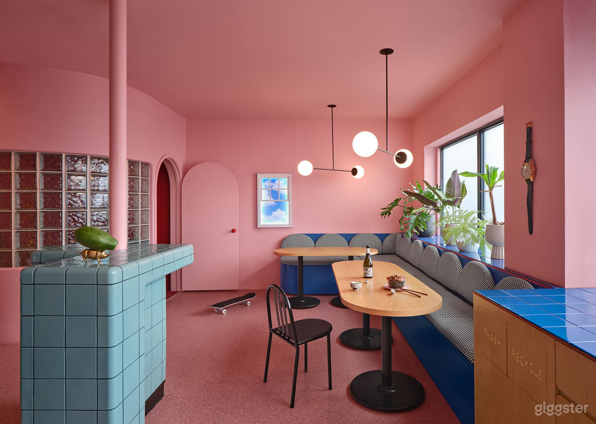 Surreal Pink Lounge with Mirrored Bathroom Photo 1