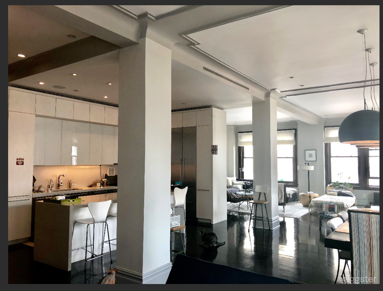 Open kitchen, dining, living room--light galore! *see https://www.rovetravel.com/listing/marmont for a 3D tour and floorplan*