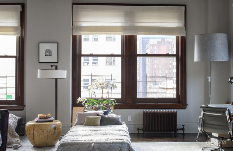  Moroccan day bed separating desk area from sitting area 