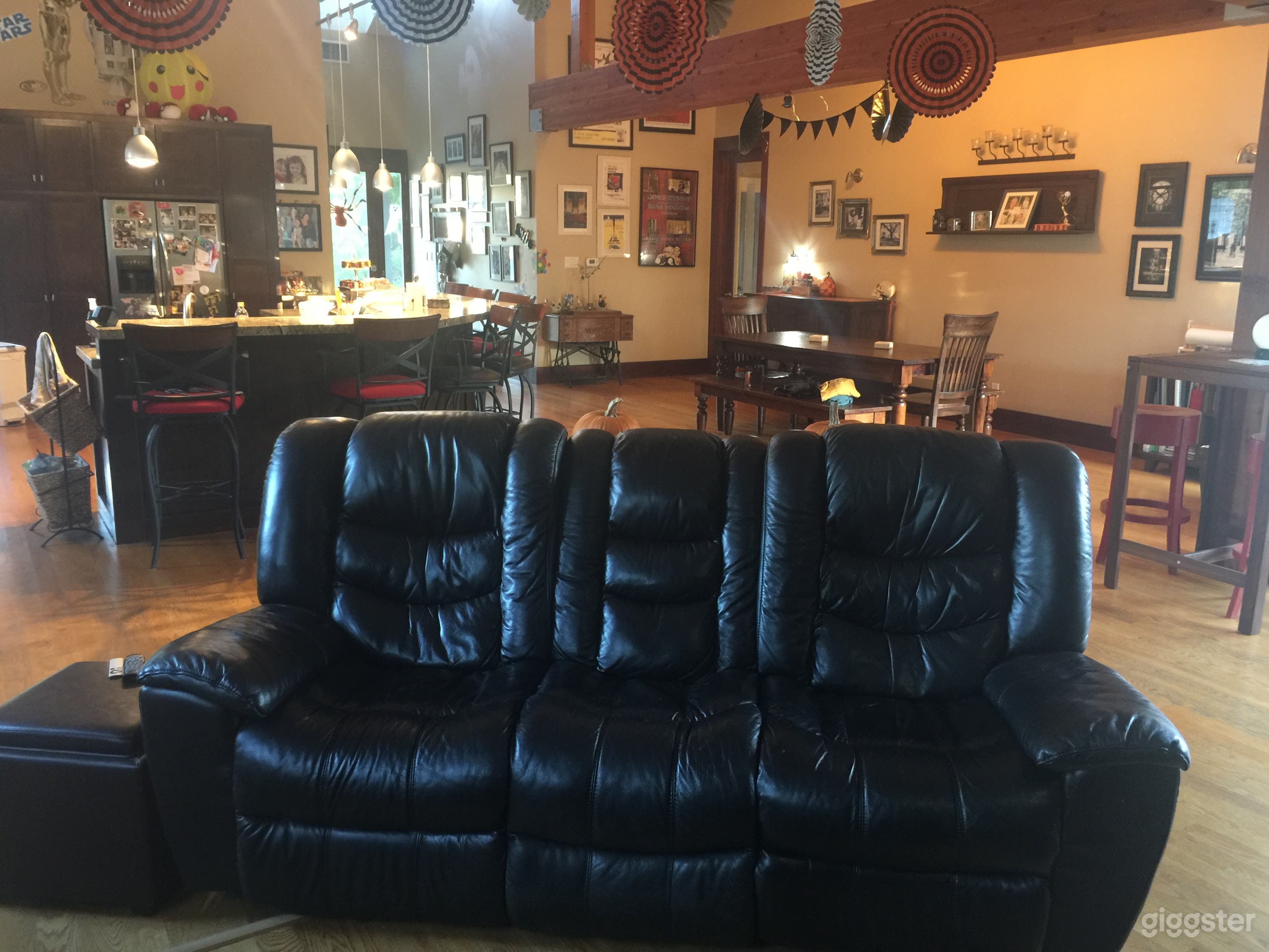 The main living area is spacious with pitched ceilings and includes the kitchen, dining room and living room. 