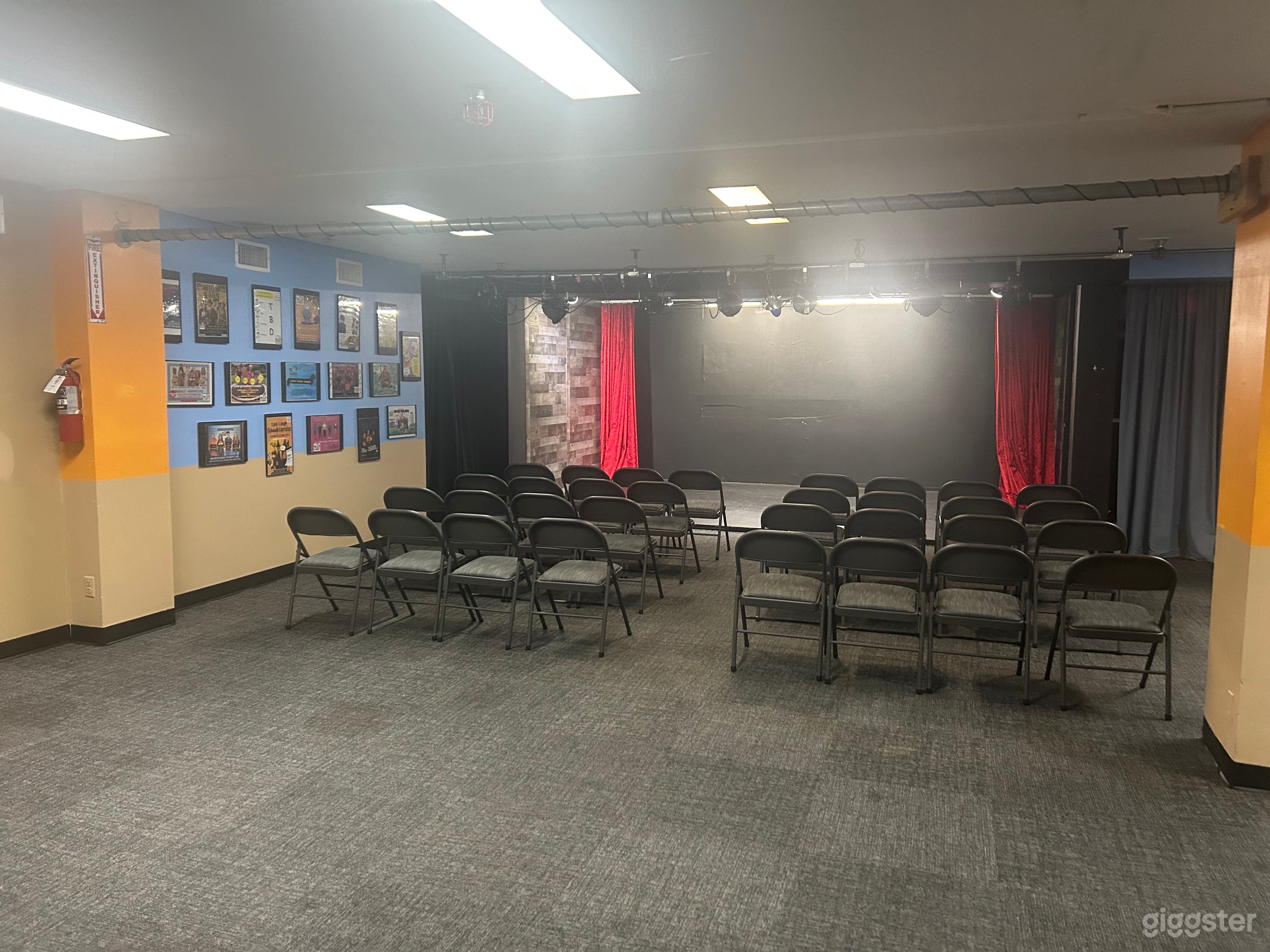 View from the back with seating and stage.