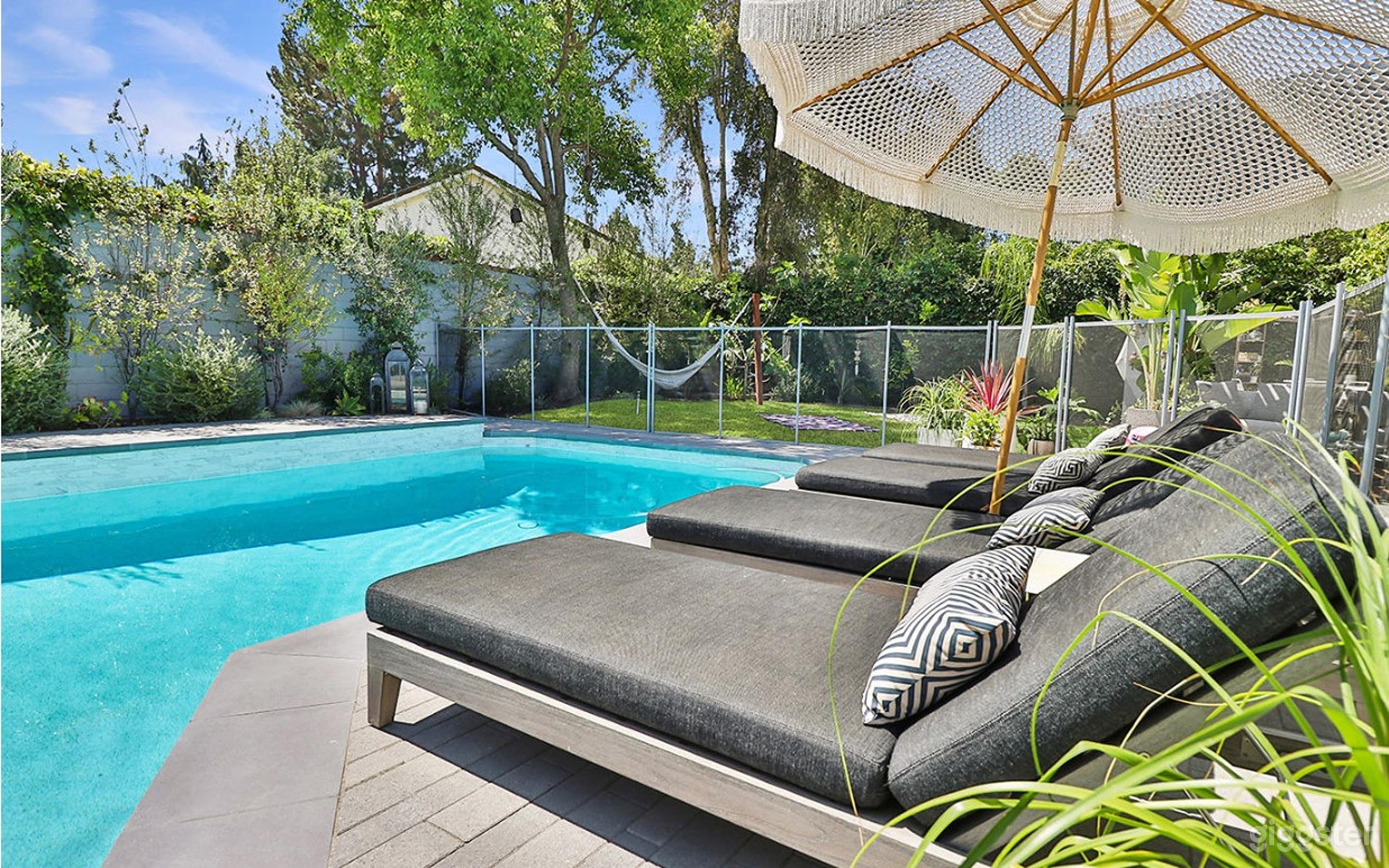 Tropical Poolside Elegance Photo 3