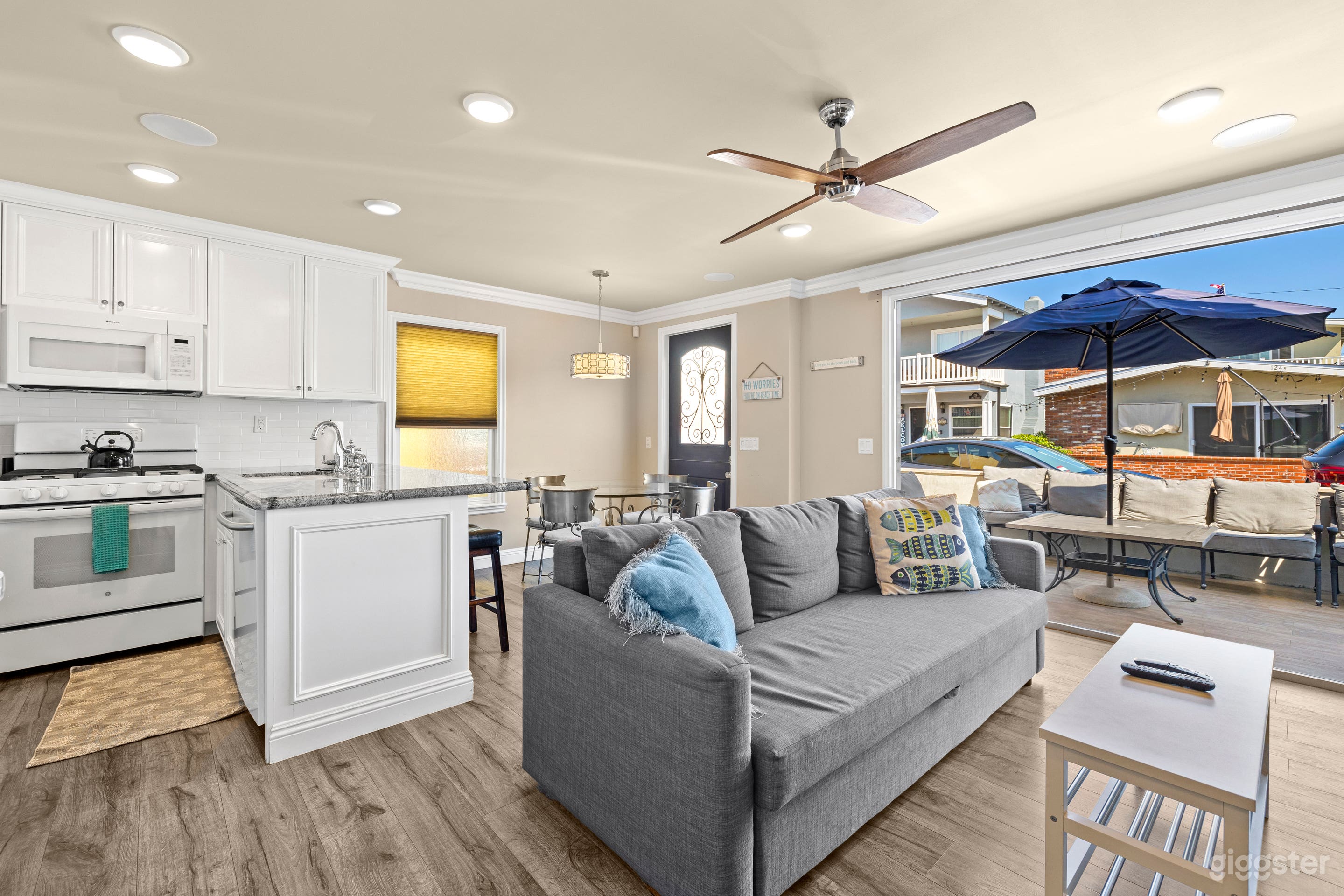 Downstairs kitchen/dining opens to patio