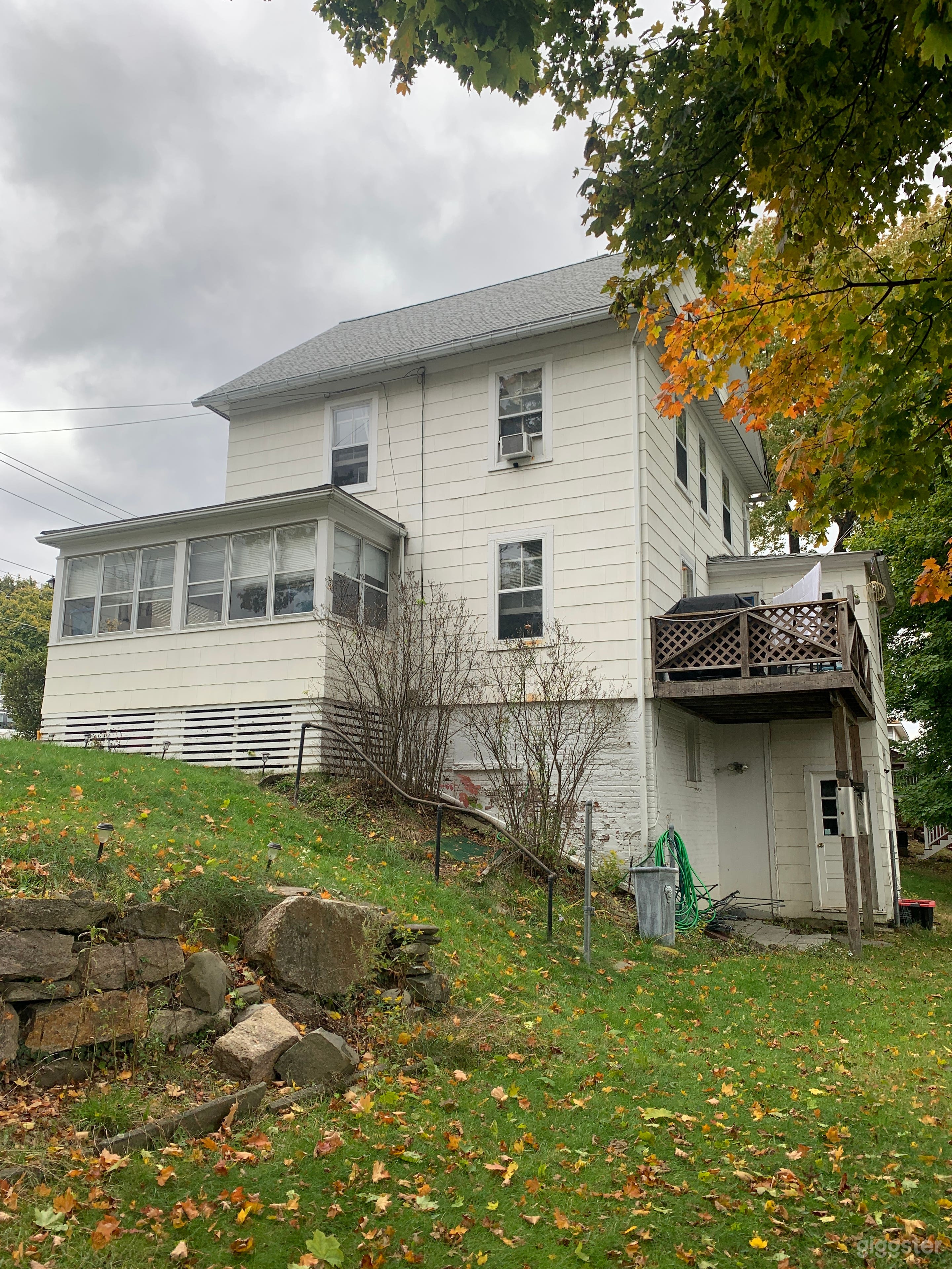 Side and back of house from lower yard
